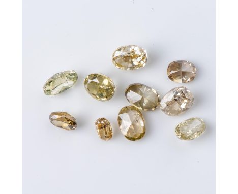 Oval-cut, colour yellow-light brown, weighing  approximately 2,14 carats in total