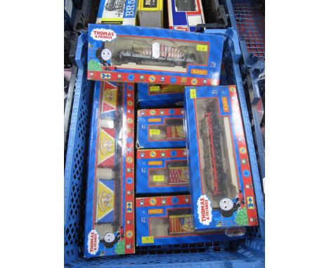 Seven Hornby "OO" Gauge 'Thomas and Friends' Rolling Stock Items, including #R.9214 circus flatbed, #R9209 circus van, #R9094