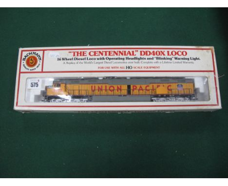 A Bachmann "HO"Gauge DD40X Sixteen Wheel Diesel Locomotive, "The Centennial", boxed, wear and marks to box noted.