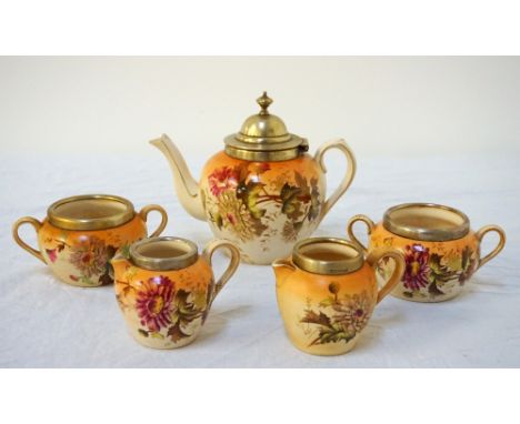 CARLTON WARE CHRYSANTHEMUM PATTERN WARESincluding a tea pot, two twin handled sugar bowls and two small milk jugs, all with s