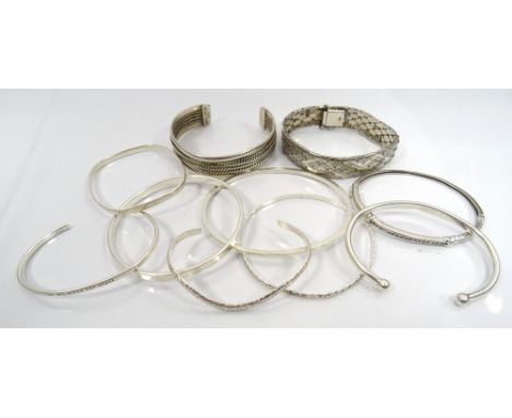 COLLECTION OF TEN SILVER BANGLES AND BRACELETSof various sizes and designs (10)