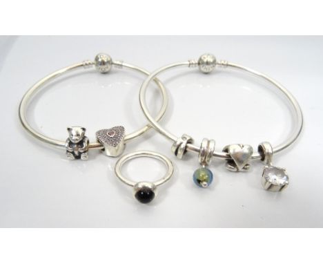 TWO PANDORA SILVER CHARM BANGLESwith various charms including a gem set heart and a teddy bear; together with a Pandora silve