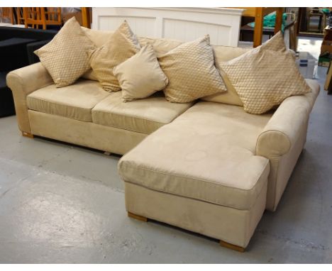 COMBINATION CORNER SOFA AND BEDwith a pull out bed section and lift up storage compartment, covered in fawn coloured faux sue