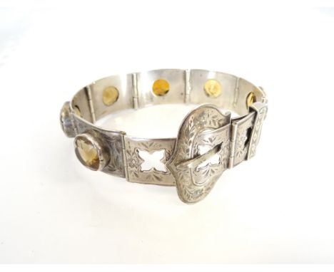 SCOTTISH GEM SET SILVER BRACELETthe engraved rectangular links set with citrine and cairngorm, with decorative buckle fasteni