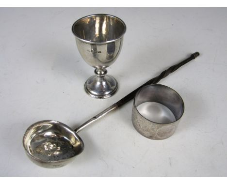 A Georgian silver toddy ladle, marks rubbed, together with a George V silver egg cup, Birmingham, 1915, and an electroplate n