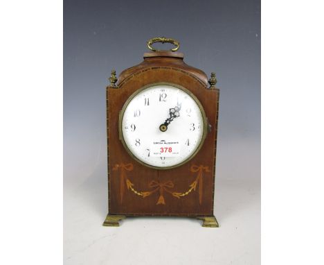 An inlaid wooden cased mantle clock