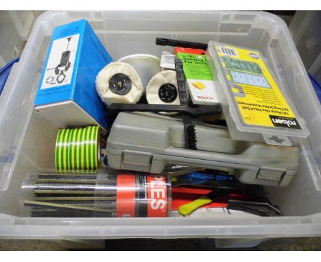 A box of miscellaneous tools including a knife and scissor sharpener 