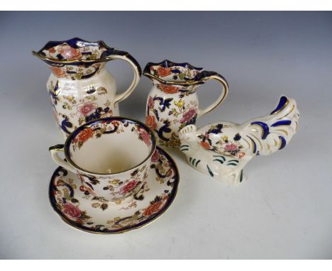 Two Masons Mandalay pattern jugs, a porcelain cup and saucer and a cockerel figurine