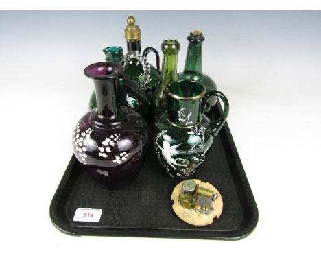 A Mary Gregory glass jug (a/f) together with a vase and a musical decanter