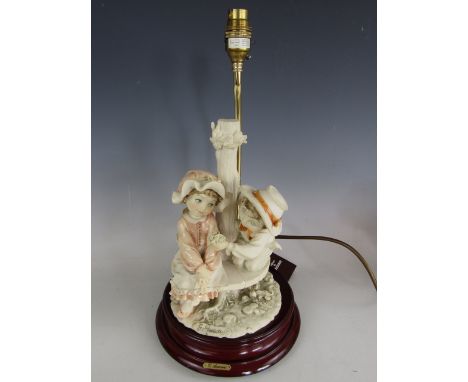 A Guiseppe Armani figural table lamp, boxed with tags 