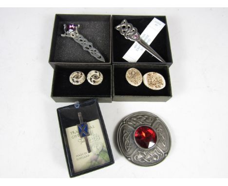 A St Andrews tie pin, three kilt pins and two boxed sets of Celtic earrings