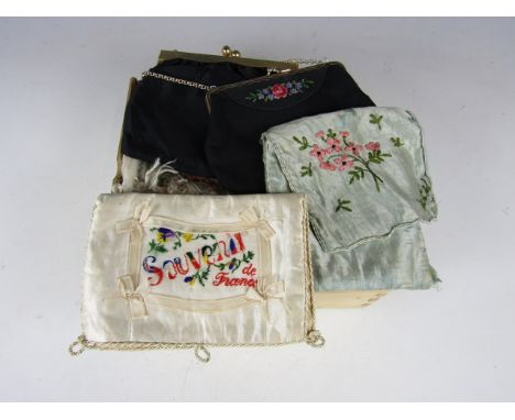 Two ladies' evening bags and a quantity of vintage textiles