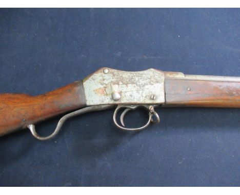 Martini-Henry 2 band rifle with 32" 1/2 barrel with side mounted bayonet and steel ramrod rear adjustable ladder sights stamp