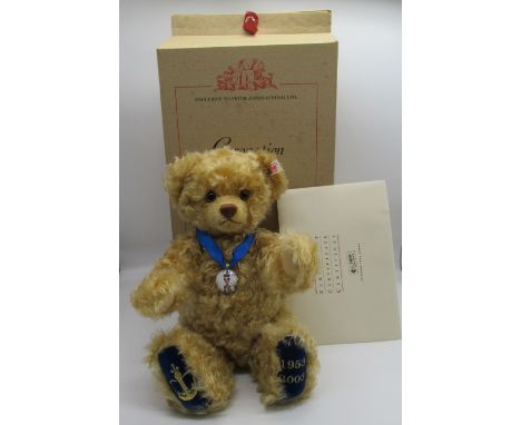 Steiff 50th Anniversary Coronation Bear in golden mohair with blue velvet foot pads embroidered with St. Edwards coronation c