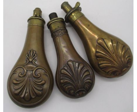 Three copper and brass shell pattern powder flask by G &amp; JW Hawksley (AF) 