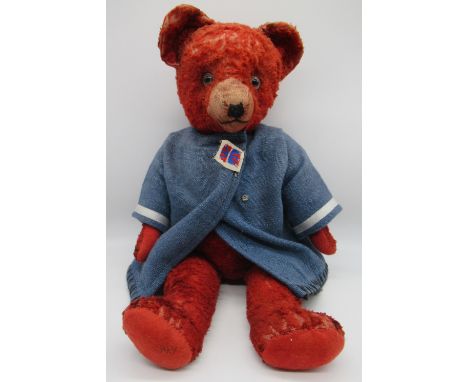 Circa 1930s artificial silk red teddy bear, possibly Deans, with light glass eyes, jointed arms and legs, stitched paws and f