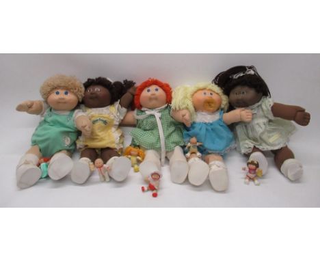 Collection of 1980's Cabbage Patch Kids dolls and plastic Cabbage Patch doll figurines (11) 