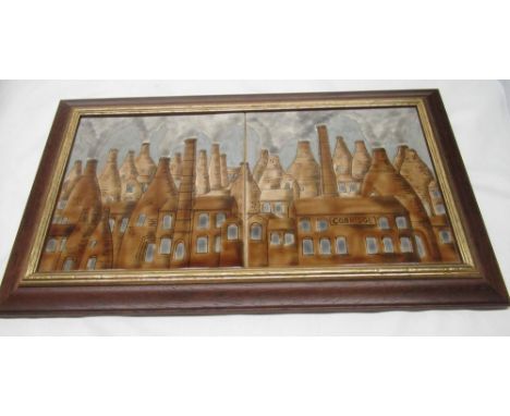 Cobridge pottery two tile wall plaque decorated with a pottery factory scene, in wooden frame 28cm x 48cm and a similarly dec