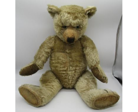 Chiltern c. 1930's Hugmee teddy bear in blonde mohair, with glass eyes, jointed arms and legs and swivel head, all original, 