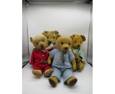 Collection of British teddy bears: c. 1940's Chiltern teddy bear with glass eyes, jointed arms and legs and swivel head, wear