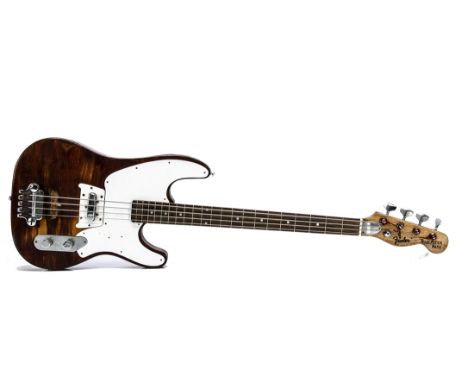 Bass Guitar / Bassbomber, a Carlsbro BassBomber amplifier/speaker s/n 0026916, a small Squier SP 10, leads together with a na
