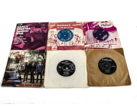 7" Singles, approximately forty-five 7" Singles and EPs of various genres with artists including Buddy Holly, The Impressions