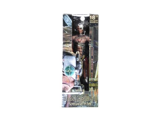 Iron Maiden Neca Eddie figure, Somewhere In Time Series - 18" Eddie figure with various guns, light up eye and motorized arm 