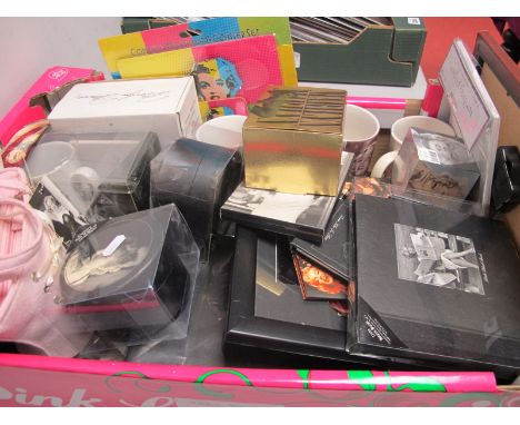 A Quantity of Marilyn Monroe Ephemera, comprising mugs, coasters, t-shirt, ties, clock, etc.