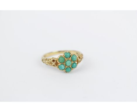 Good Quality 9ct Gold Turquoise set cluster ring in carved setting 2.9g total weight 