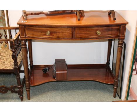 Edwardian Mahogany bow fronted inlaid desk with Walnut inlaid stringing , 2 Drawers with brass handles, supported on turned l