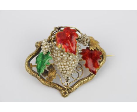 High quality Edwardian opulent brooch of Vine decoration of seed pearls, with red and green enamel leaves, 52mm in Diameter, 