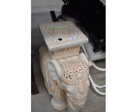 A ceramic elephant seat