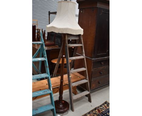 A traditional mahogany standard lamp