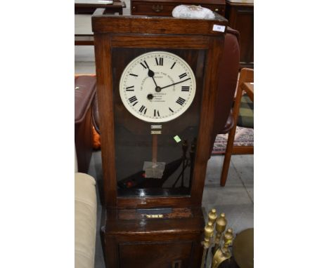 An early 20th Century oak cased time recorder clock, factory or office, dial bearing name 'Gledhill Brook' , numbered 76215