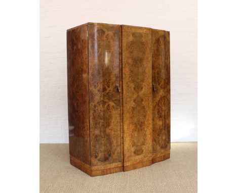 Art Deco Burr Walnut Wardrobe Circa 1930s, breakfront outline, the flame mahogany interior housing clothes rail, recesses, sh