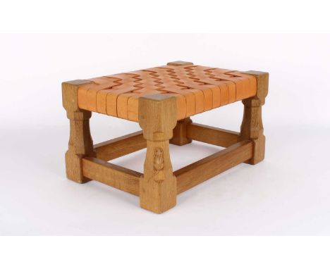 Workshop of Robert "Mouseman" Thompson Carved Oak and Woven Tan Leather Footstool Of rectangular outline, raised on block and