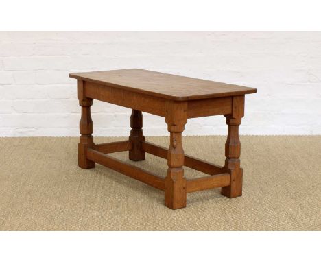 Robert "Mouseman" Thompson of Kilburn Oak Coffee Table Circa 1950s, the rectangular adzed top riased on baluster and block st