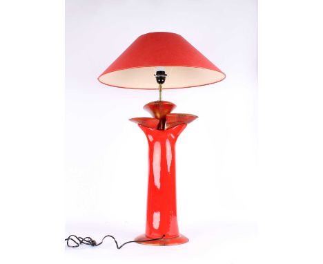 François Chatain (French, Mid-Late 20th Century) Tall Ceramic Table Lamp Circa 1980s, three 'pebble' forms in brushed red, go