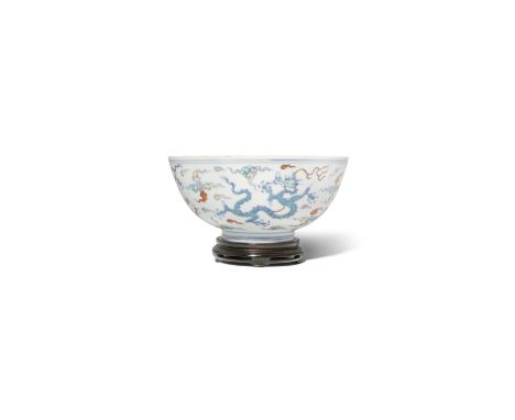 A CHINESE DOUCAI  'FIVE DRAGON' BOWL KANGXI/YONGZHENG The U-shaped body painted in coloured enamels with four five-clawed dra