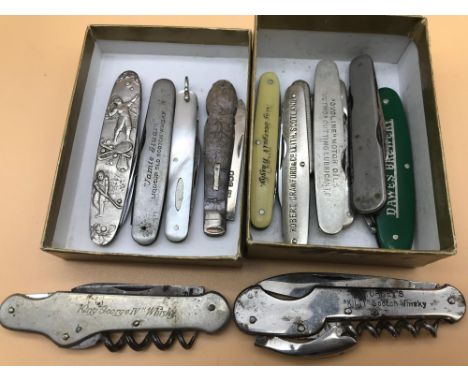 A quantity of vintage pen knifes which includes German sporting pen knife, Scotch Whisky pen knifes and mother of pearl pen k