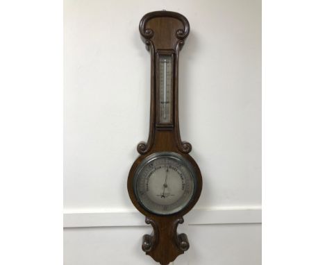 A Fine example of a banjo barometer by J.H. Steward, London. Measures 73cm in length. 