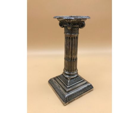 A single Sheffield silver Corinthian Column candle stick.  Made by Hawksworth Eyre &amp; Co Ltd. 