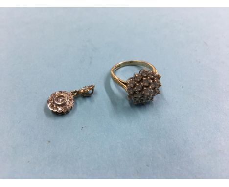 A 9ct cluster ring and a diamond mounted pendant, 4g