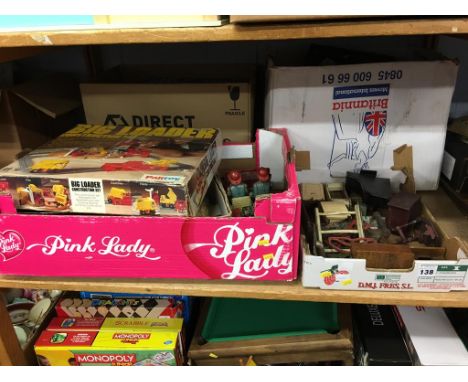Shelf of vintage toys and games