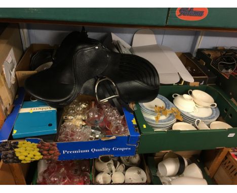 Shelf of assorted including a saddle