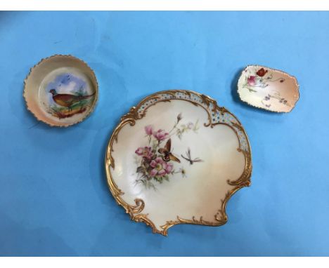 A Royal Worcester plate, with puce marks and two Worcester dishes