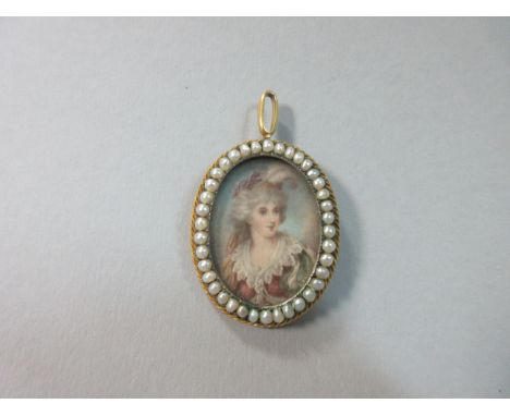 A pendant miniature portrait in pearl embellished frame, the oval watercolour portrait of a late 18th century lady, with powd