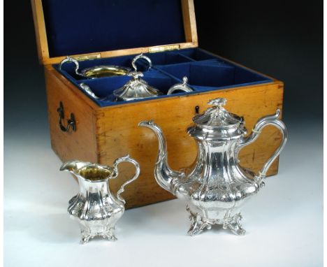 A Victorian silver four piece teaset by James Dixon & Son, Sheffield 1839, comprising a teapot of melon shape, the lobed body
