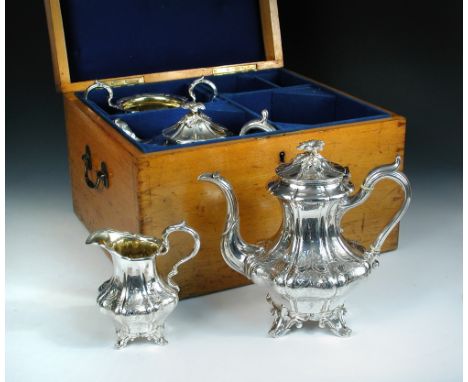 A Victorian silver four piece teaset by James Dixon & Son, Sheffield 1839, comprising a teapot of melon shape, the lobed body