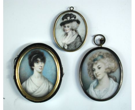 English School (circa 1810)  Portrait miniature of a lady with a pearl head dress and white dress, verso inscribed 'First wif